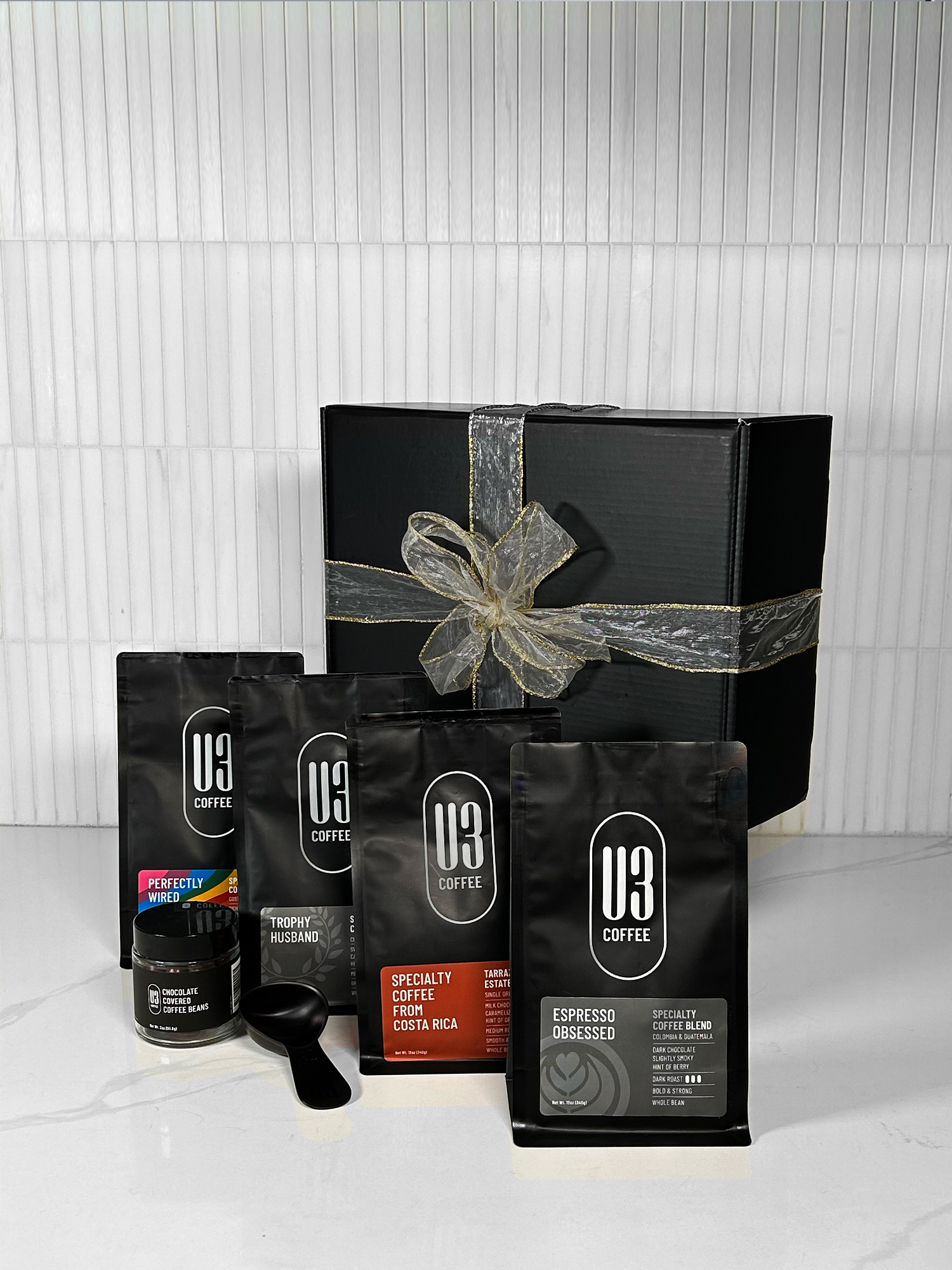 Gift Box including 4 different 12 oz bags of U3 Coffee whole bean, chocolate-covered coffee beans and coffee scoop