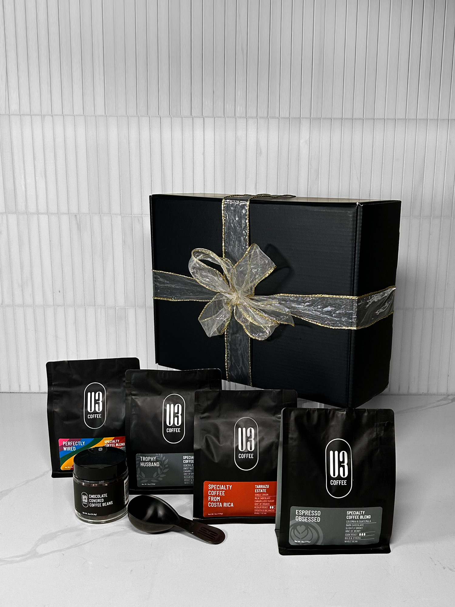 Gift Box including 4 different 6 oz bags of U3 Coffee whole bean, chocolate-covered coffee beans and coffee scoop